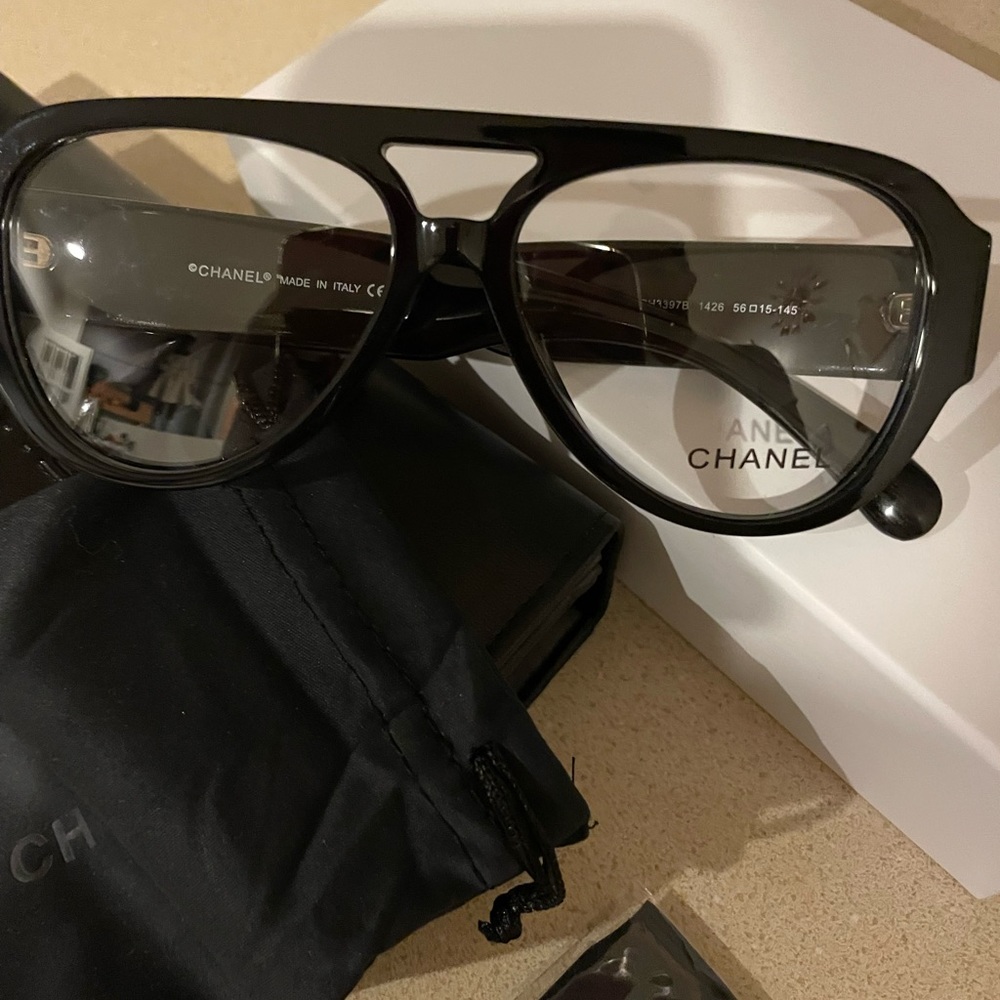 CHANEL Black Acetate Frame & Transparent Lens Eyeglasses with gold accents